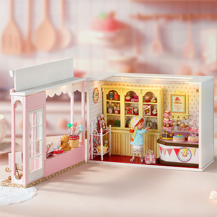 Tienda de dulces. Maqueta 3D con diseño de panel de puerta abierta, realista con gran detalle y luces led.