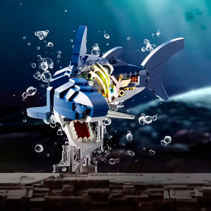 Maqueta 3D mecanizada de tiburón con 687 piezas, equipada con luces integradas y mecanismo de manivela que permite movimiento dinámico.