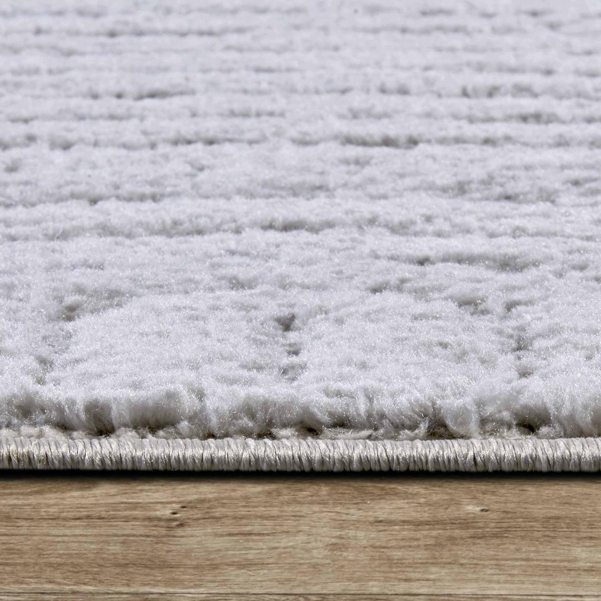 Tapis salon, motif géométrique, texture relief, lym chaleureux