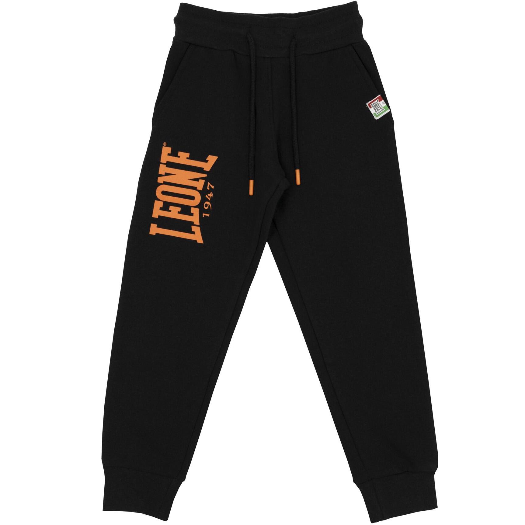 Pantalón de chándal básico con estampado de león para niño con logo grande.