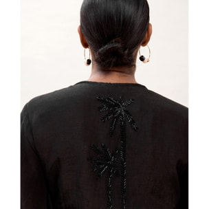 Blusa con nodo e dettagli tonali