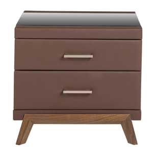 Mesita de noche Angel Cerdá con estructura de madera chapada en nogal natural tapizada en polipiel marrón chocolate y patas de madera chapada en nogal natural tapa de cristal templado tintado en negro 60x46x56cm