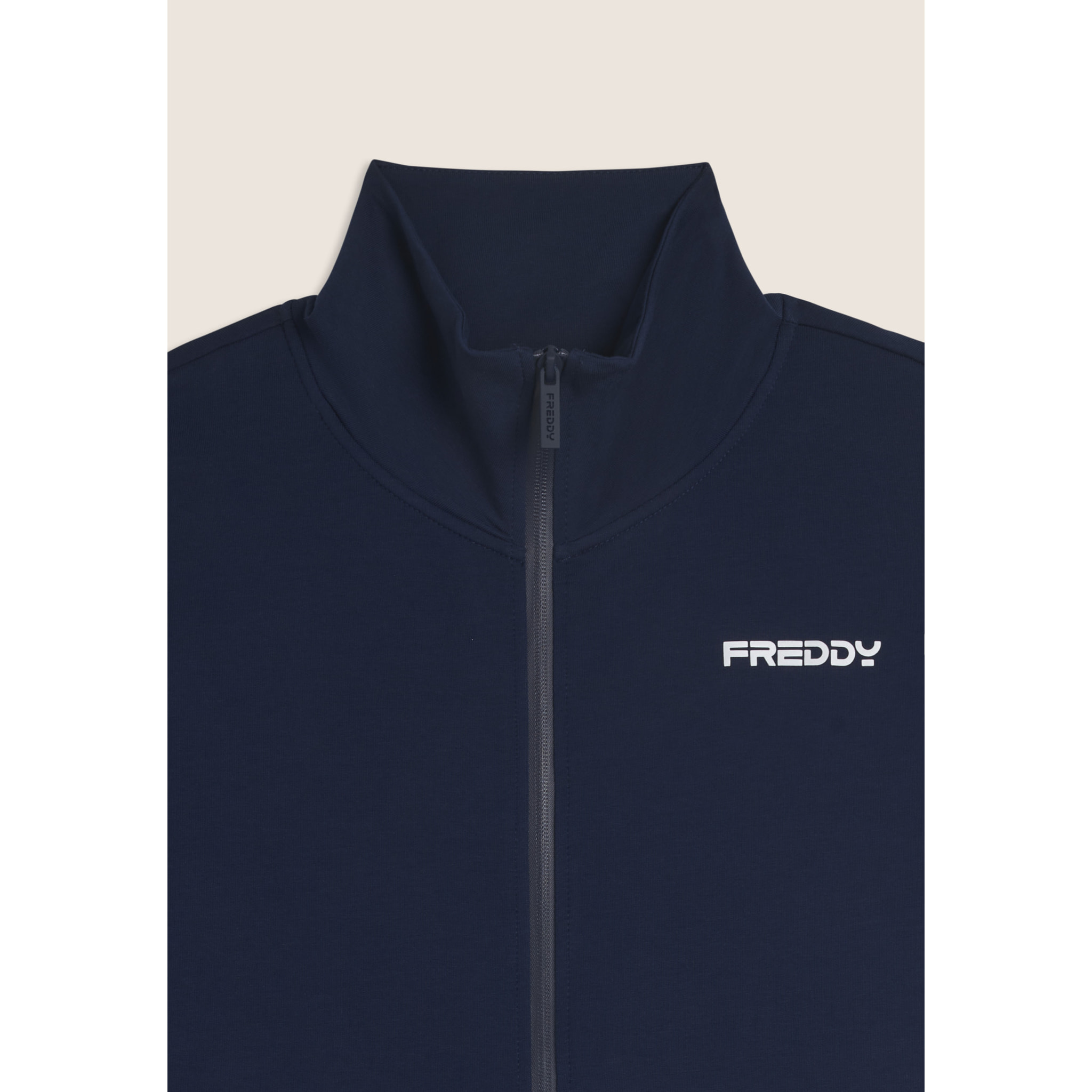 Tuta uomo zip e collo alto in French Terry con bande in tono