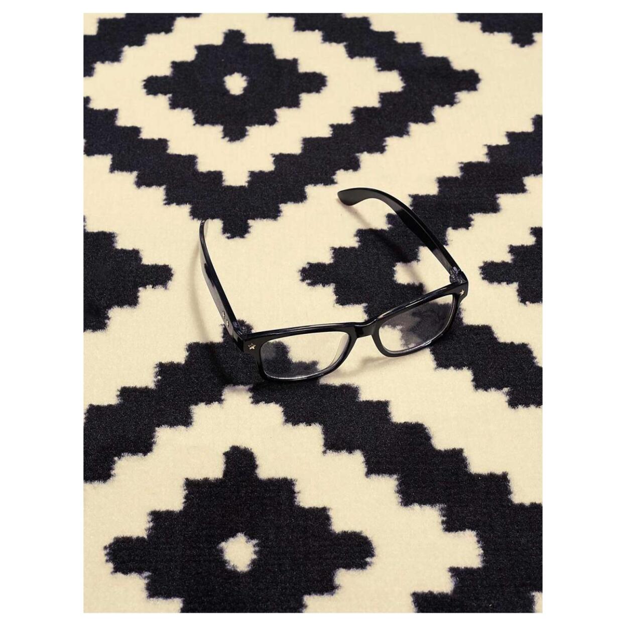Tapis Kihe Noir et blanc motif géométrique scandinave