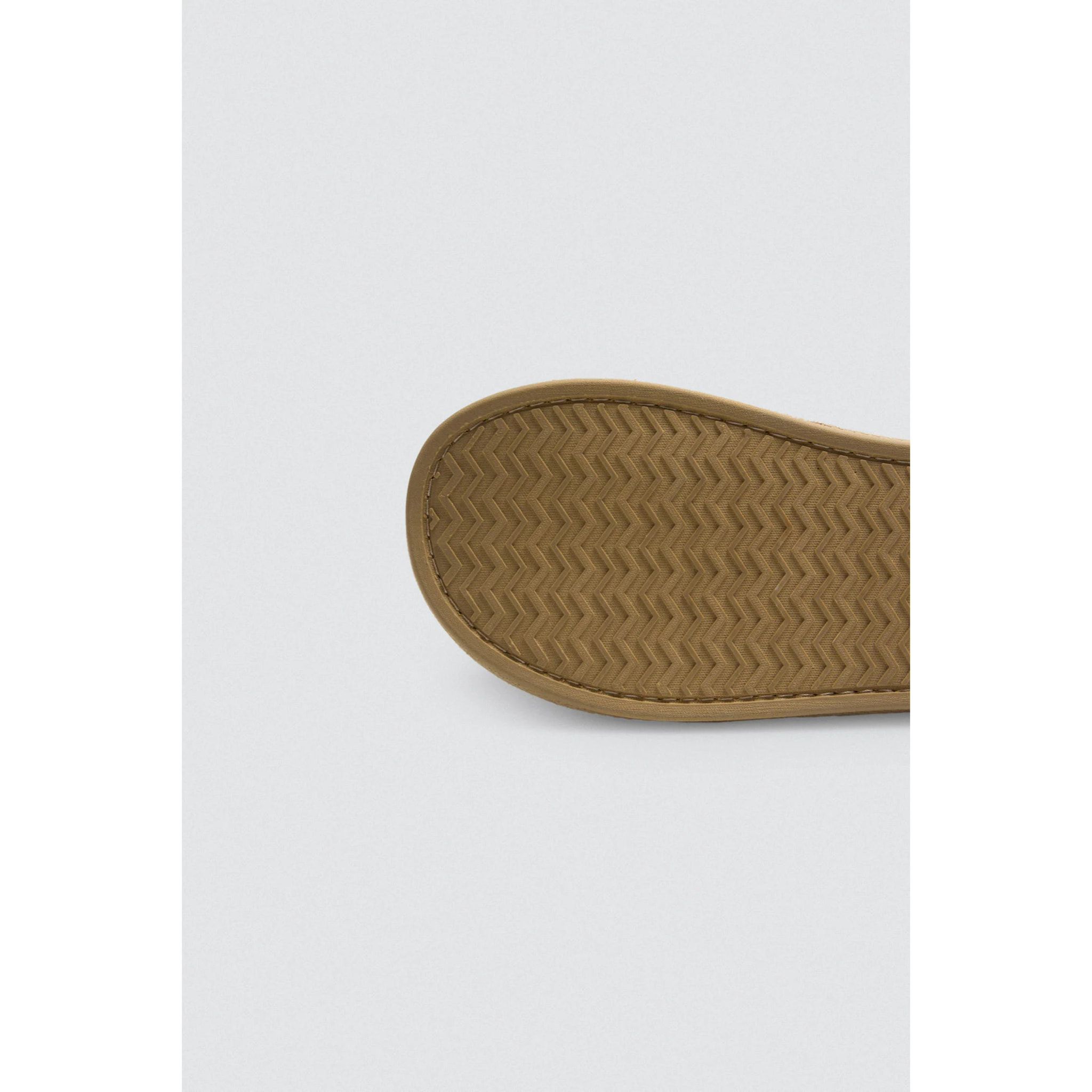 Pantofole in pelliccia con stampa etnica