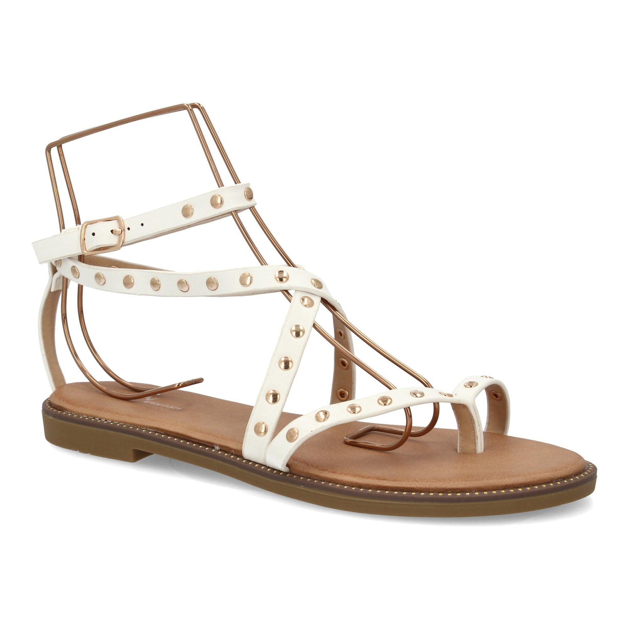 Sandalia plana con tiras y tachuelas para mujer.