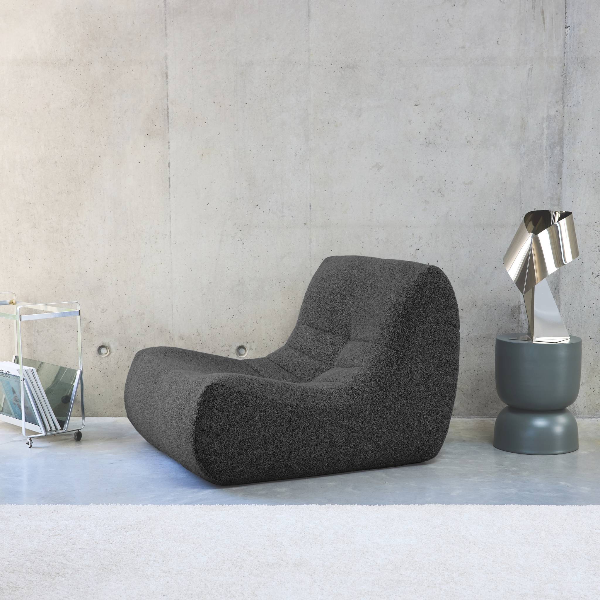 Fauteuil chauffeuse en bouclette texturée anthracite style contemporain 1 place