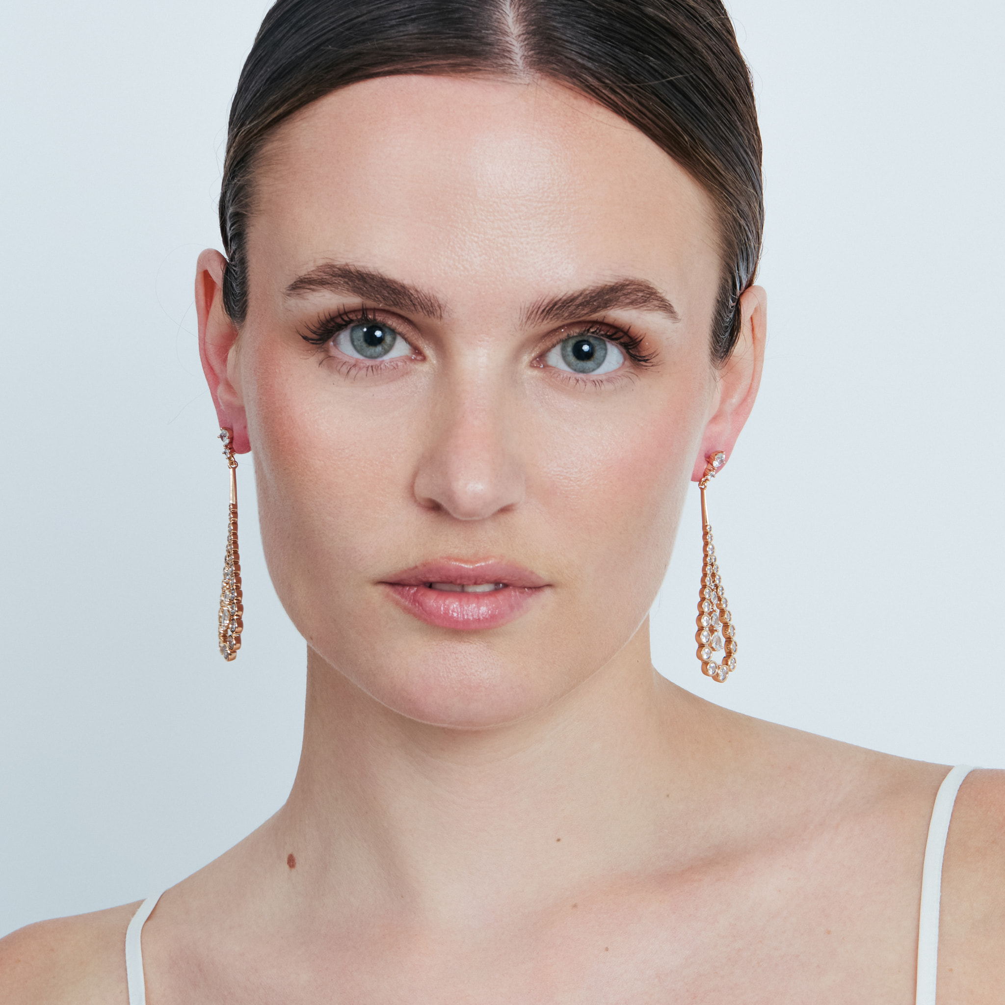 Pendientes Nyex acabado oro rosa 18k