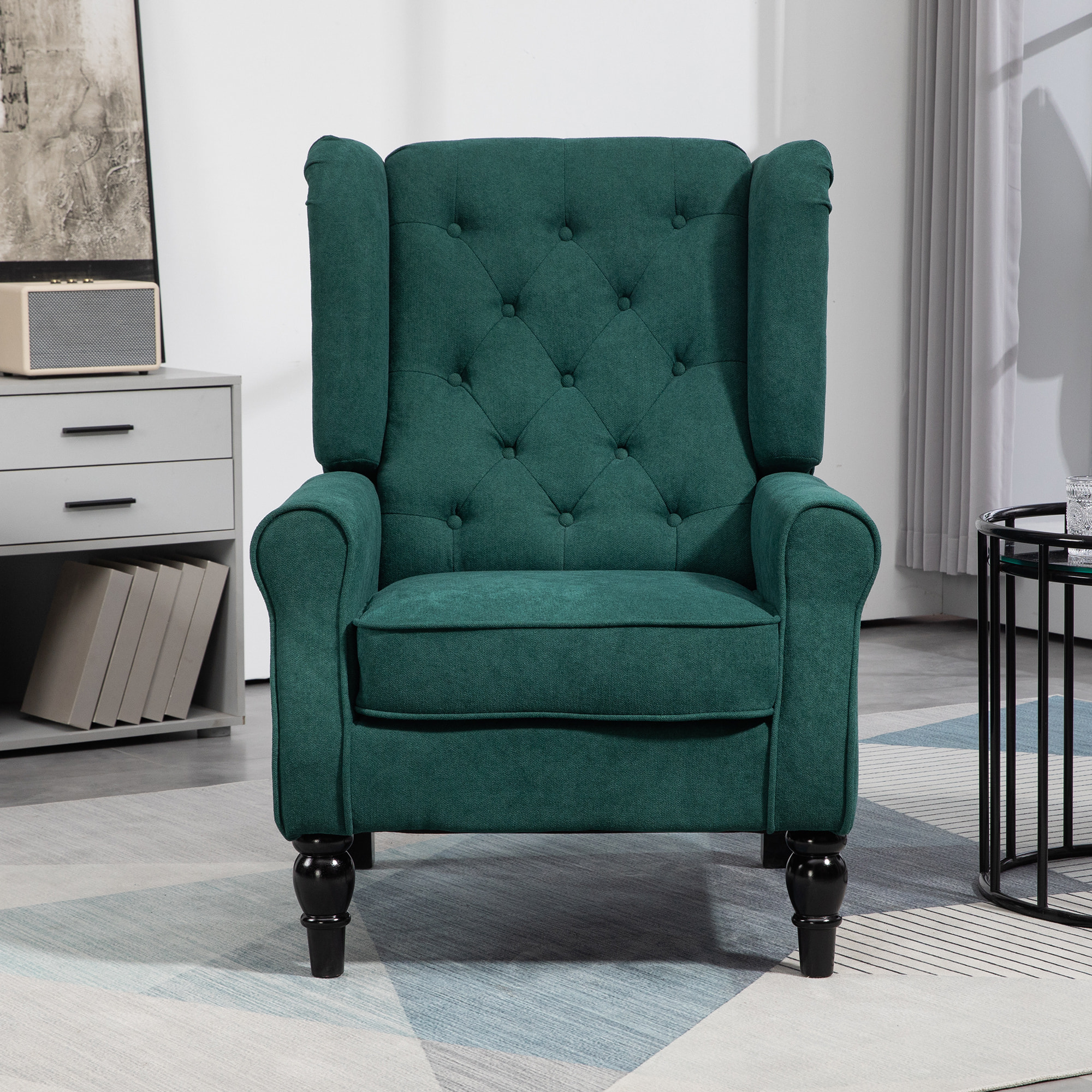 Fauteuil à oreilles style Chesterfield dossier capitonné grand confort bois noir tissu vert
