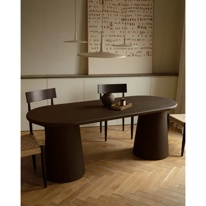 Table de salle à manger ovale en microciment ton marron en différentes tailles