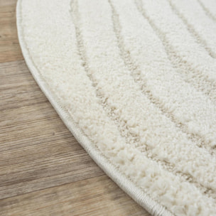 Tapis rond tendance ton sur ton aux motifs simples et à la forme originale