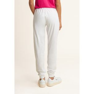 Pantaloni con elastico sul fondo e dettagli floreali