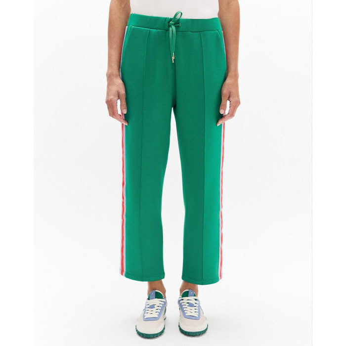 Pantaloni da jogging con striscia laterale tricolore, coulisse regolabile e dettagli metallici.