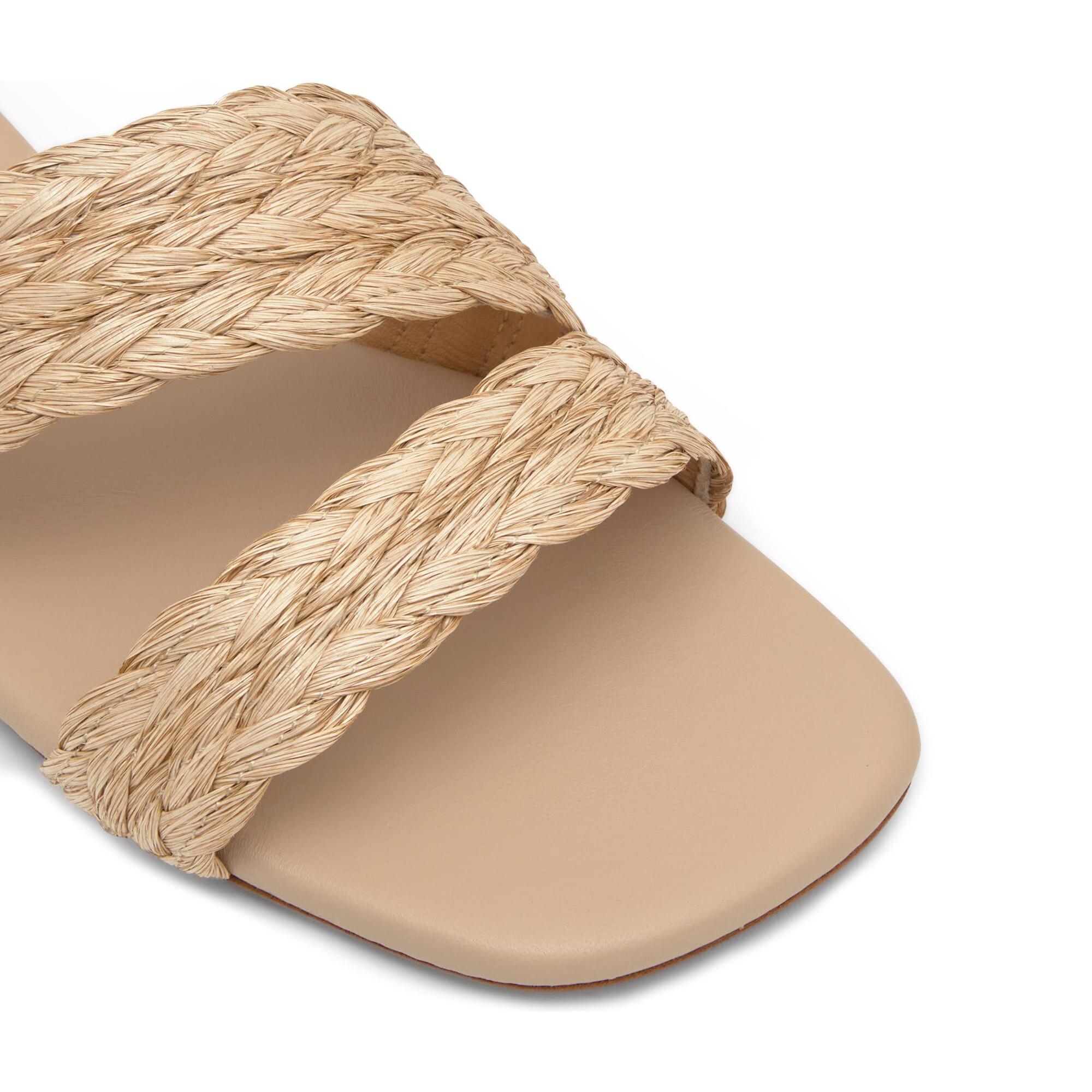 Sandalia plana slip-on Paz en rafia trenzada