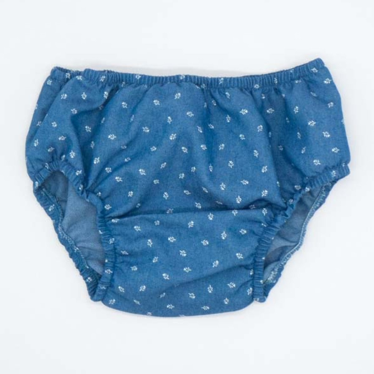 CUBREPAÑAL DENIM FLORES BLANCAS