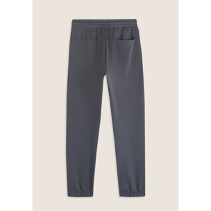 Pantaloni slim in interlock con stampa UT e cuciture