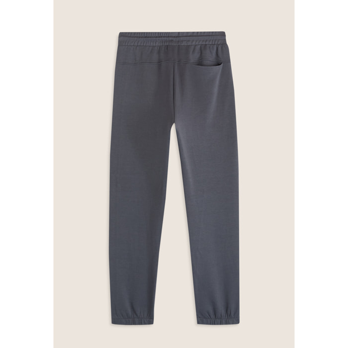 Pantaloni slim in interlock con stampa UT e cuciture