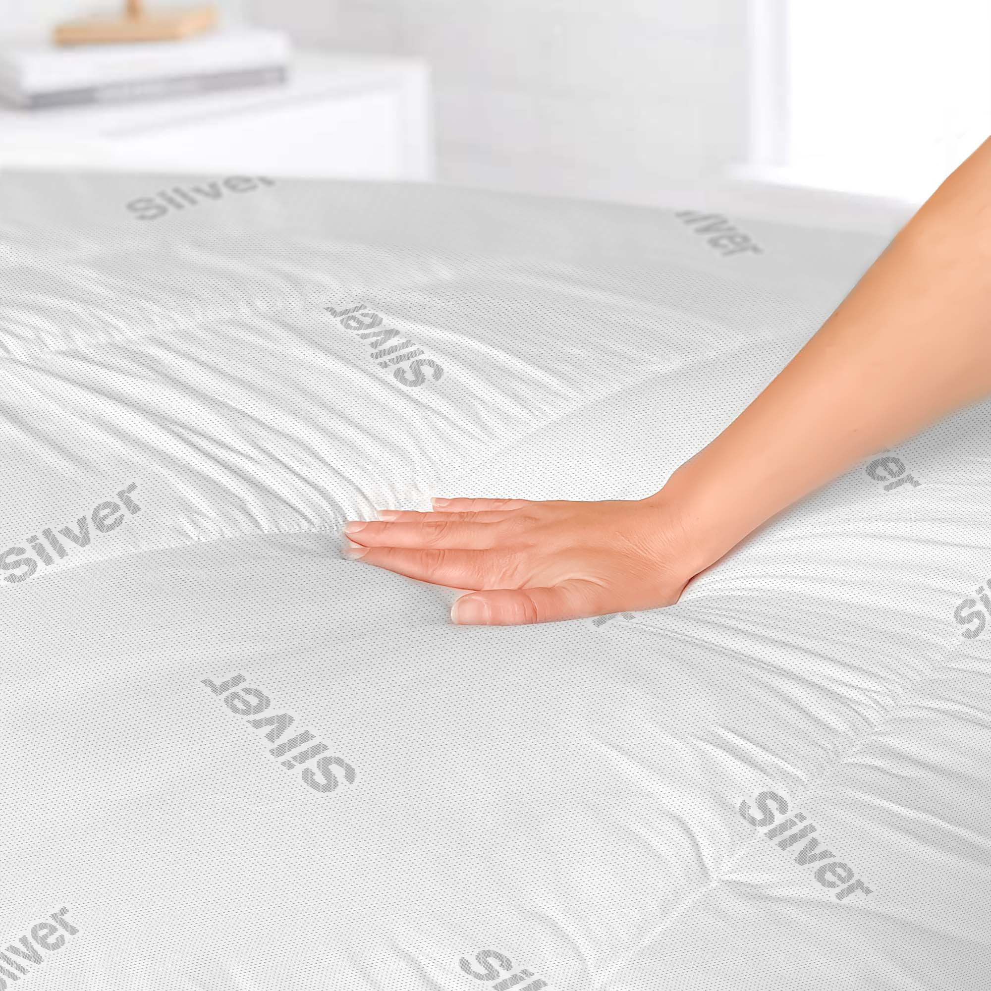 TOPPER SILVER TRAPUNTATO CON ELASTICI