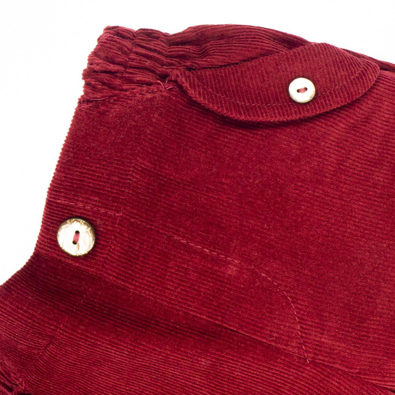 Pantalón con bolsillo de tapeta granate