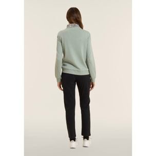 Tuta con zip e collo alto con interno animalier