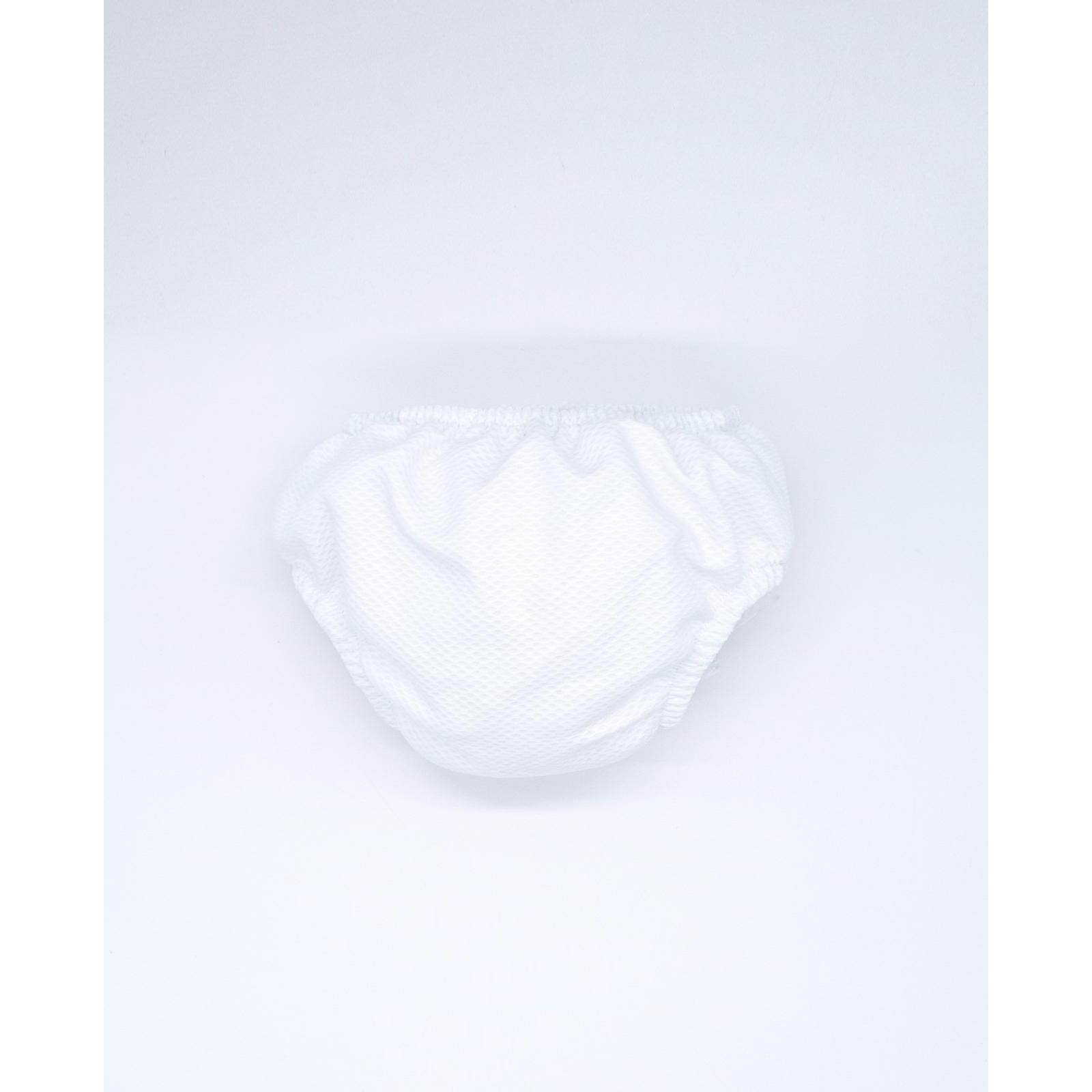 Cubrepañal de pique blanco. Elastico en la cintura y en las piernas.