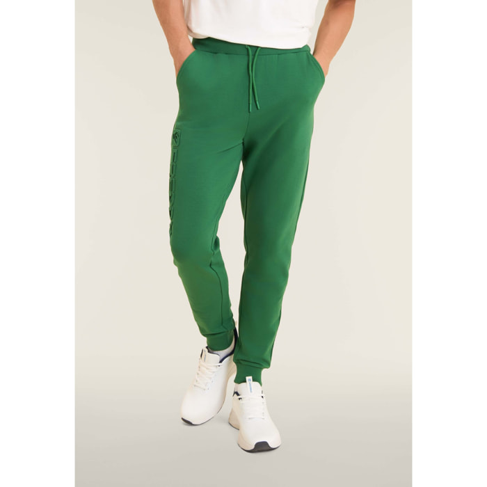 Pantaloni slim in interlock con maxi logo in rilievo