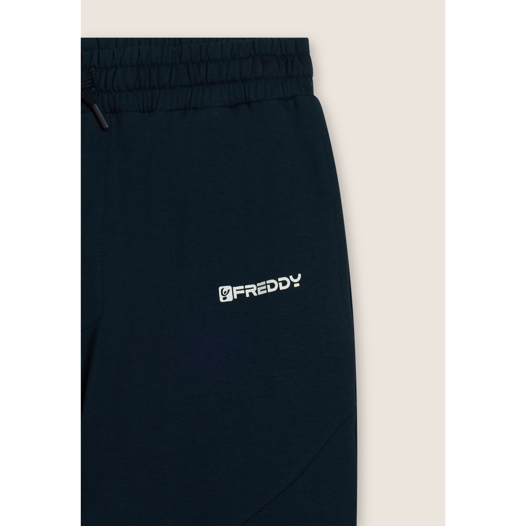 Pantaloni regular in felpa con stampa lucida e cuciture