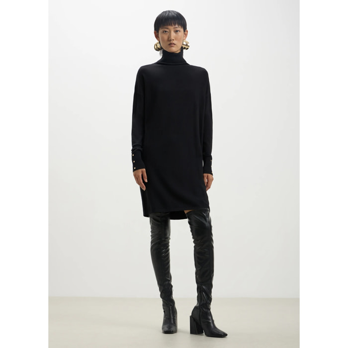 Vestito a costina con collo dolcevita