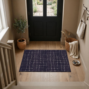 Petit tapis d'entrée motif géométrique déformé gris et beige