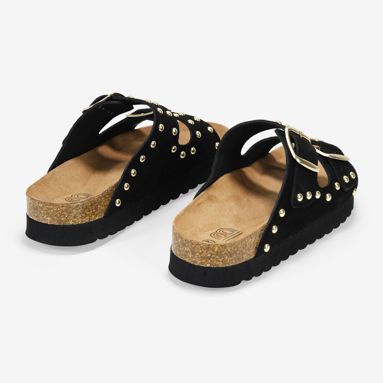 Sandalias de plataforma negras en piel con hebillas y tachas metálicas