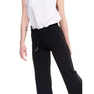 Pantalones deportivos de mujer brillantes hasta los tobillos