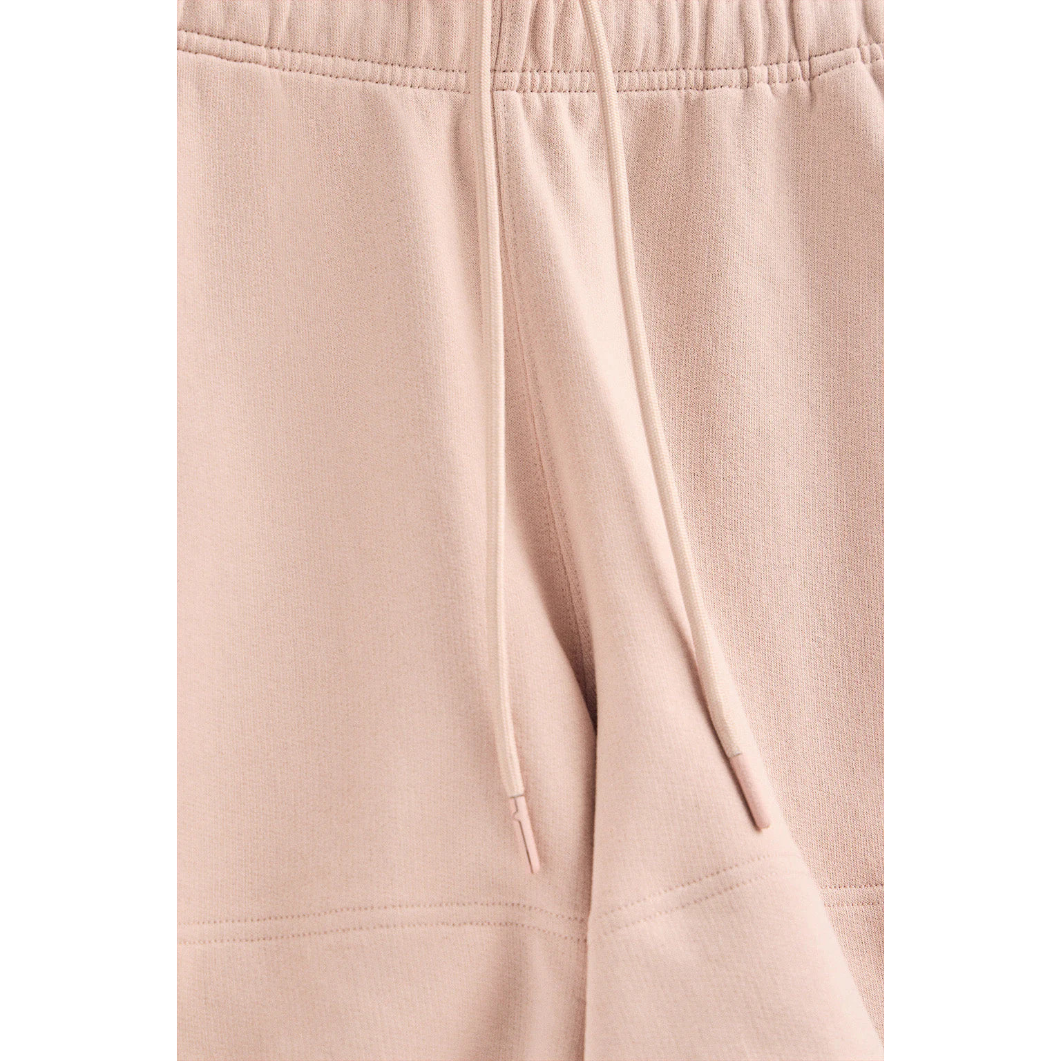 Pantaloncini in cotone nude con logo ricamato