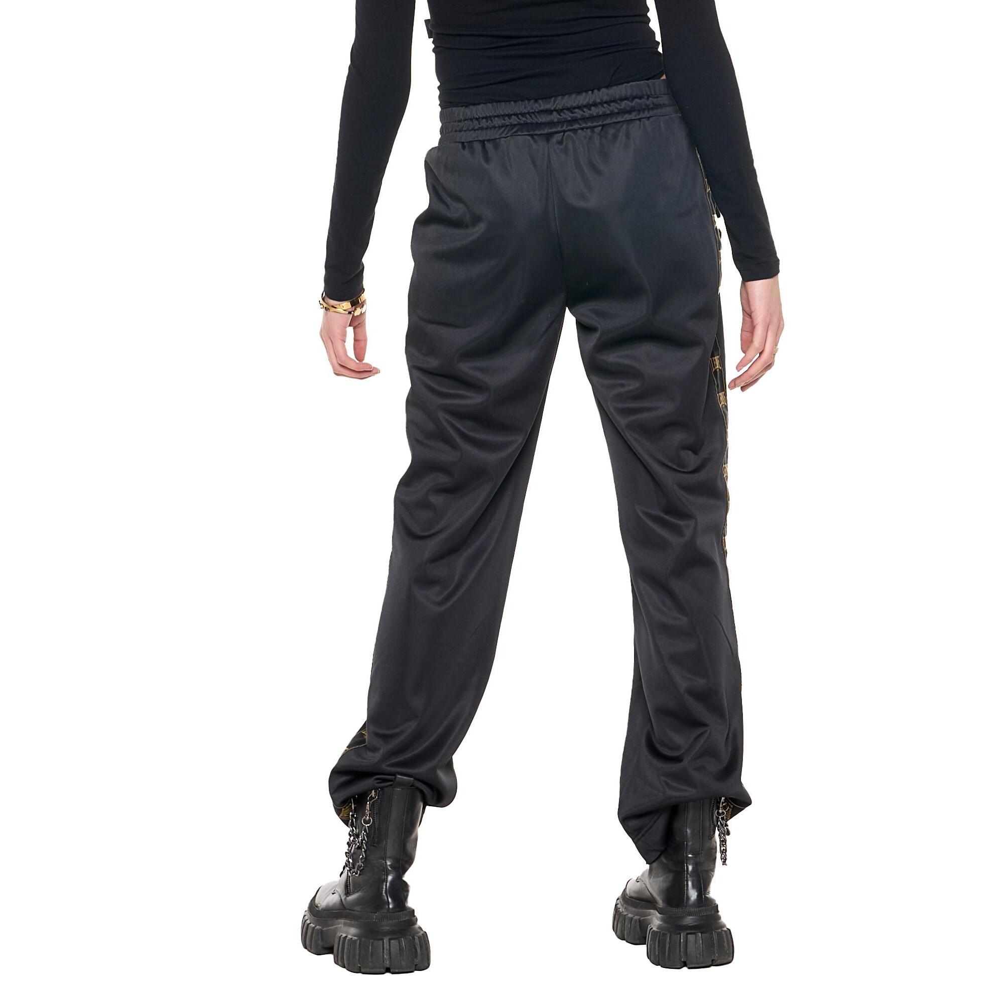 Pantalón deportivo de mujer de invierno con bandas verticales "Authentic Gold"
