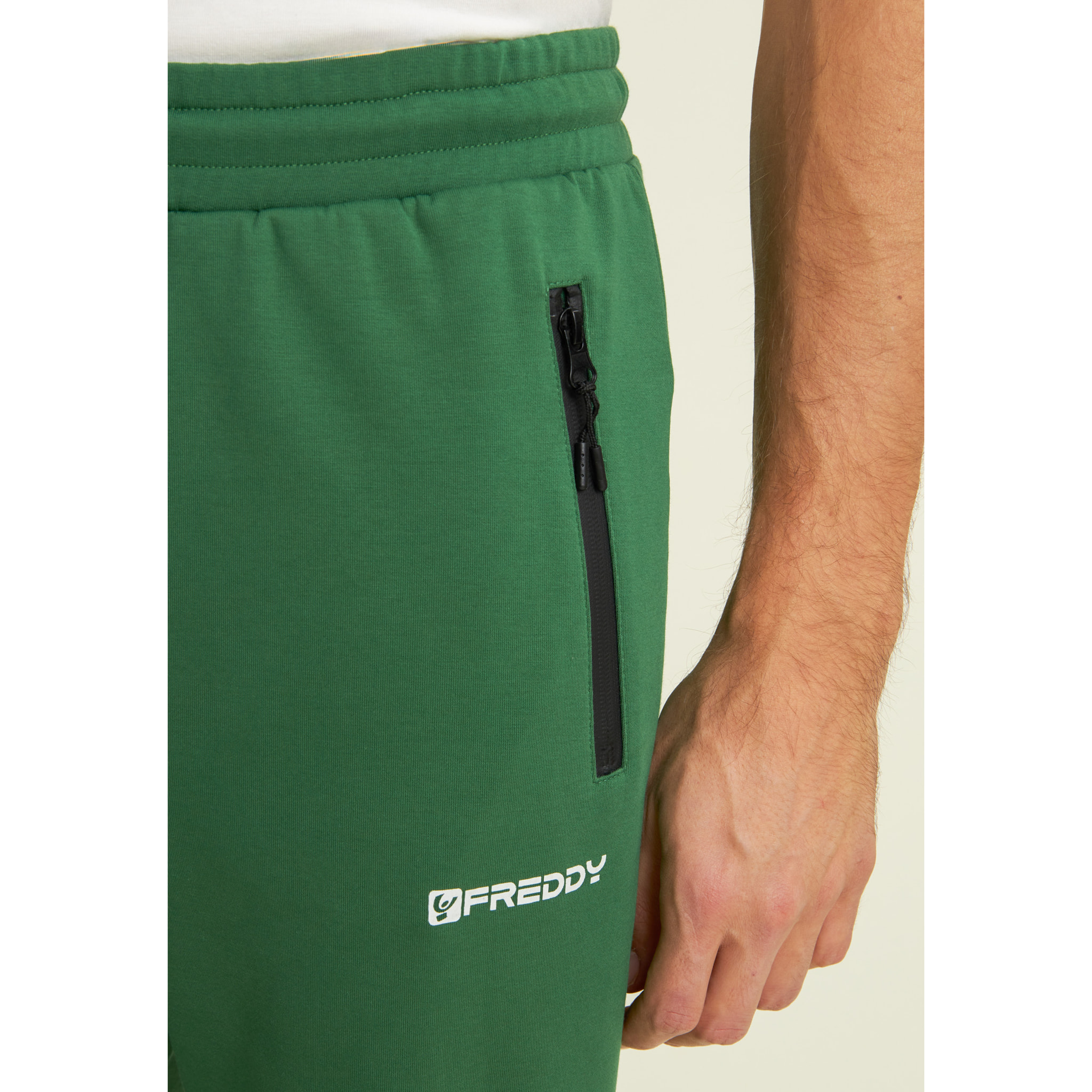 Pantaloni a carota in interlock con zip laterali