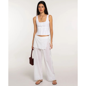 Pantalones anchos con bordados de mujer