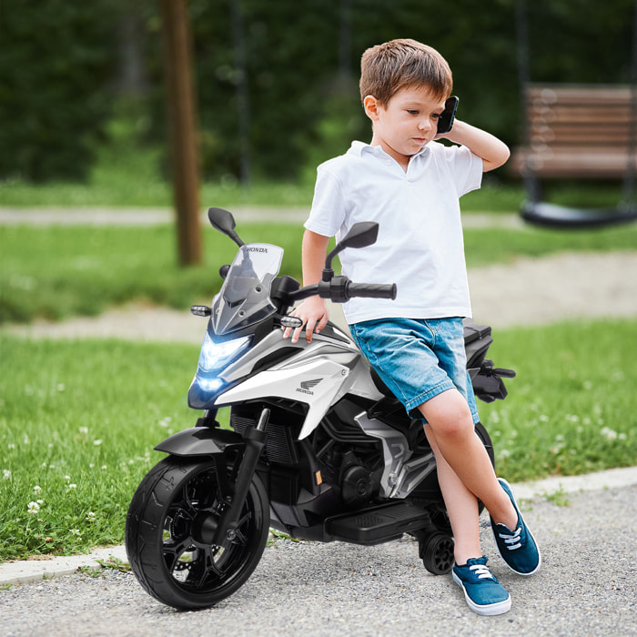 Moto électrique enfant Honda NC750x - musiques, feux AV LED, entrée USB MP3 jack - 2 roues support aux. - blanc