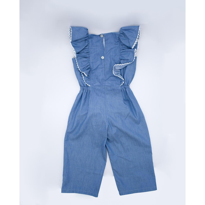 Mono azul. De tirantes y pantalón largo, con volantes en la parte superior.