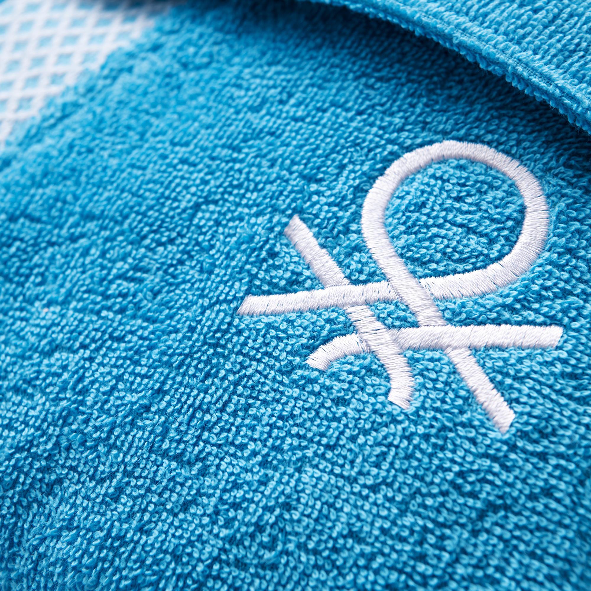 Albornoz 380gsm 100% algodón con ribete jacquard azul summer benetton