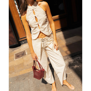 Pantalón recto de mujer con sobrefalda bordada y hebillas
