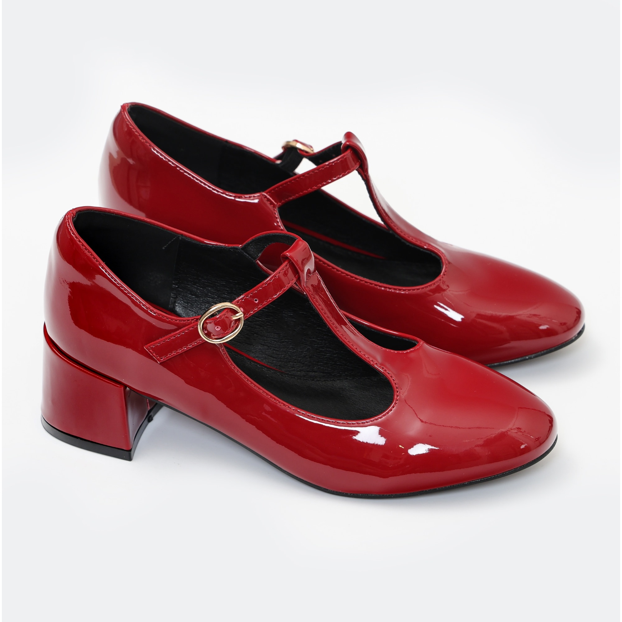 Dècolletè in simil pelle verniciata con tacco basso quadrato