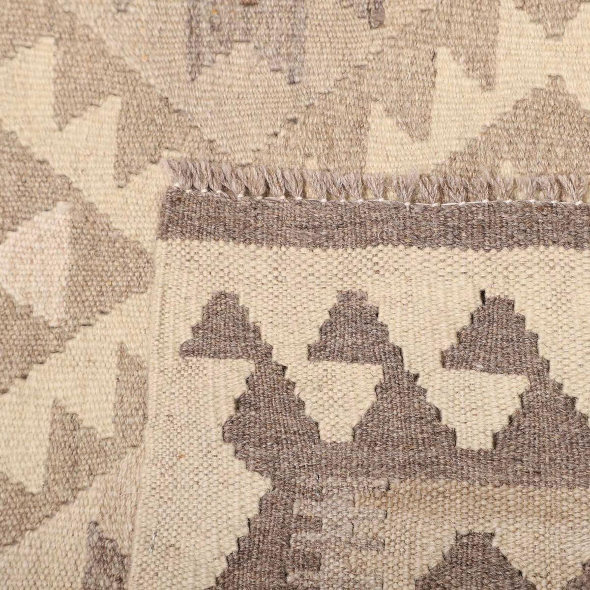Tapis kilim au motif ethnique, tissé plat en laine naturelle
