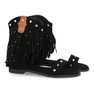 Sandalias planas con flecos y tachuelas
