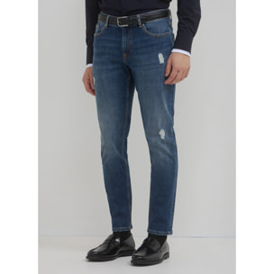 Jeans skinny con strappi