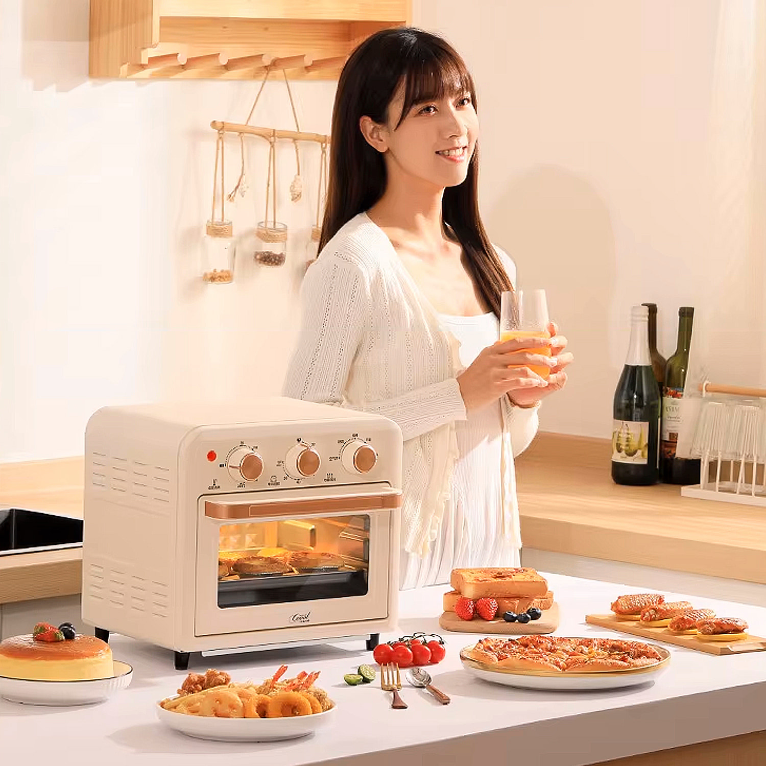 Horno freidora de aire con 15 litros de capacidad. Panel de control mecánico y 1300W de potencia.