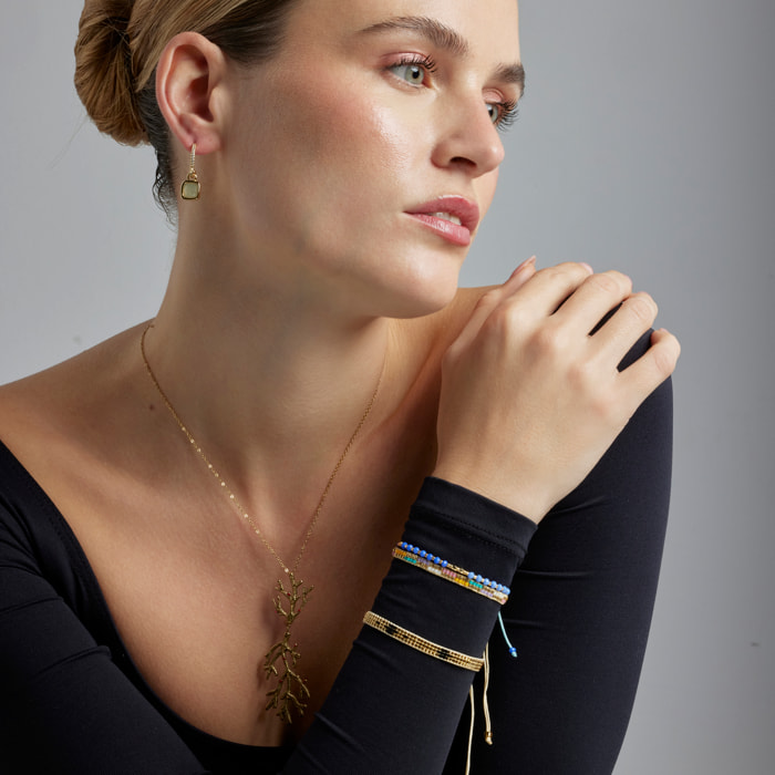 Pulsera con Cristal Azul acabado oro 18k