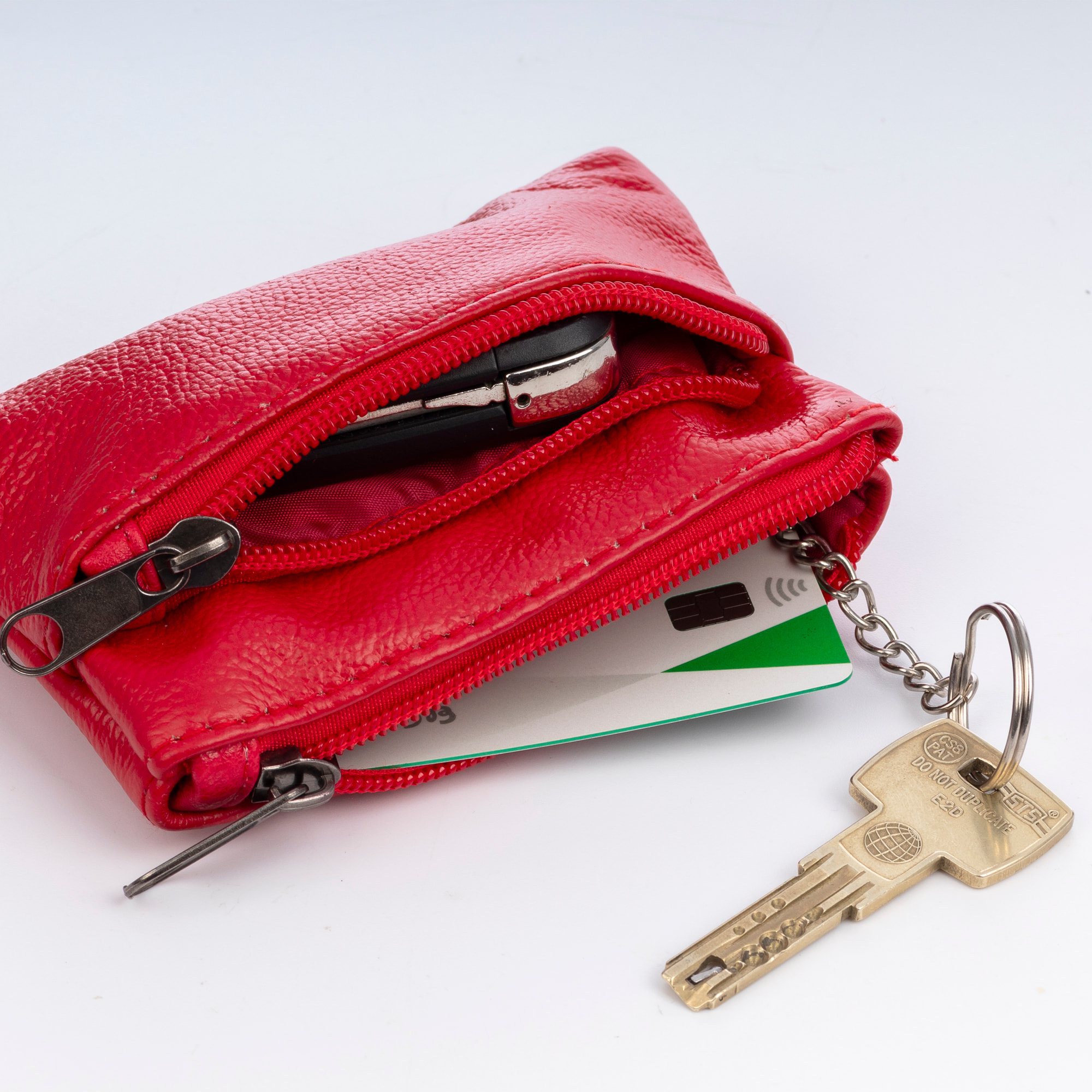 Atrani portamonedas con doble compartimento de piel Dollaro. Llavero interior.