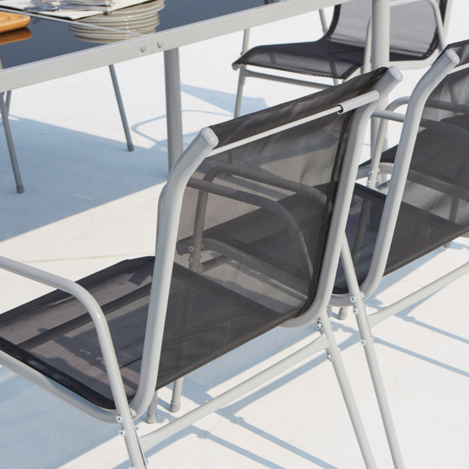 Table de jardin et 8 chaises en acier et toile PVC gris ATIMA