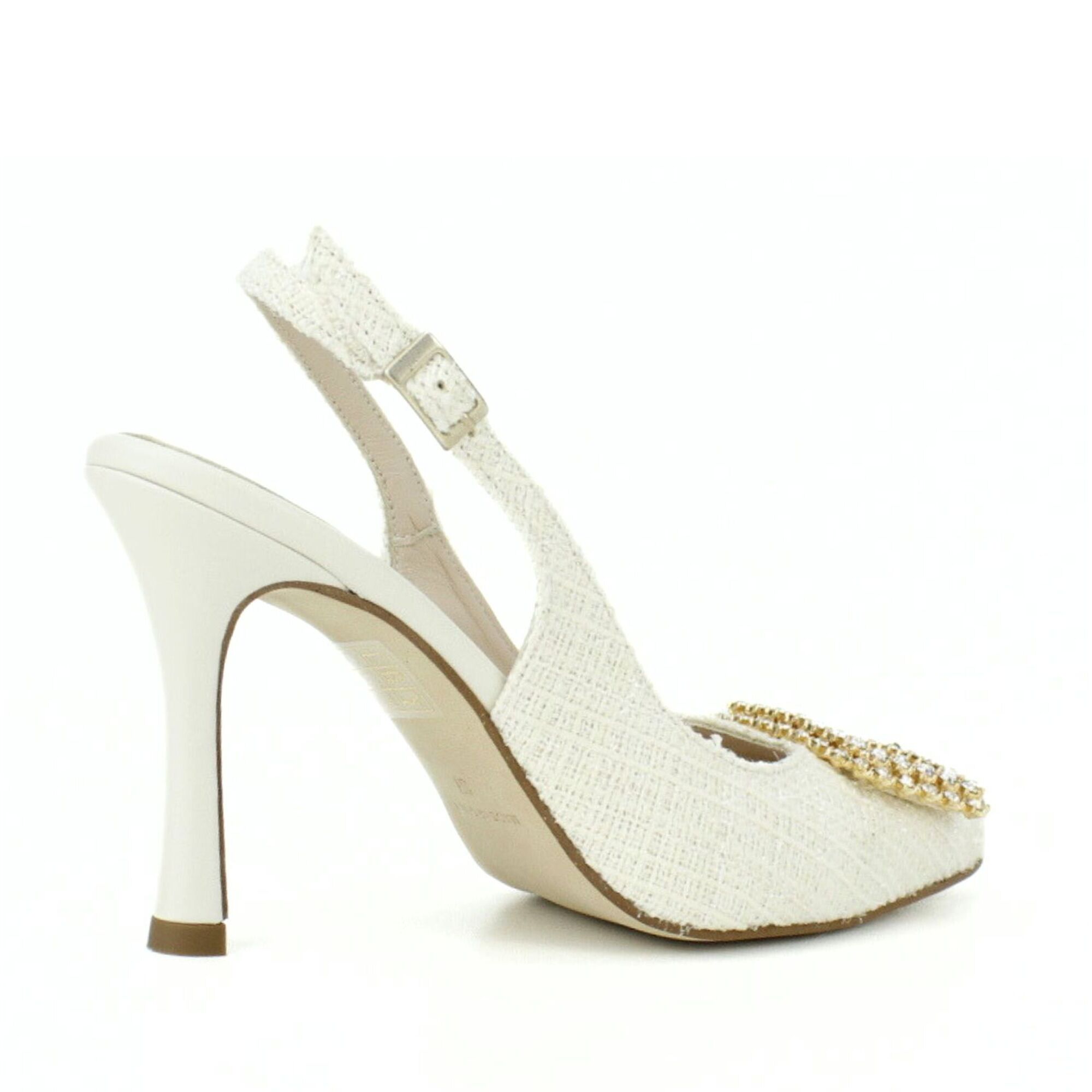 Salón destalonado en chanel blanco. Tacón fino de 9cm