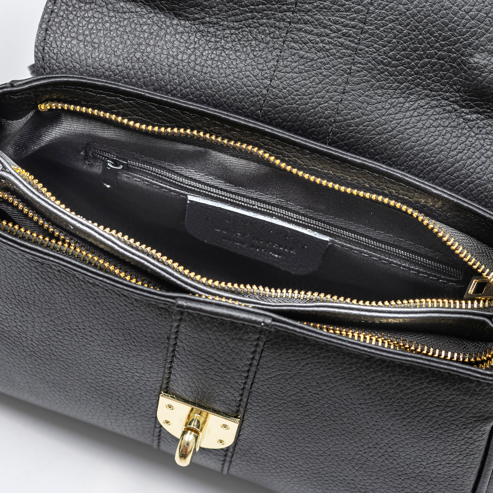 Asiago bolso de mano bandolera piel auténtica dollaro. Diseño exclusivo.