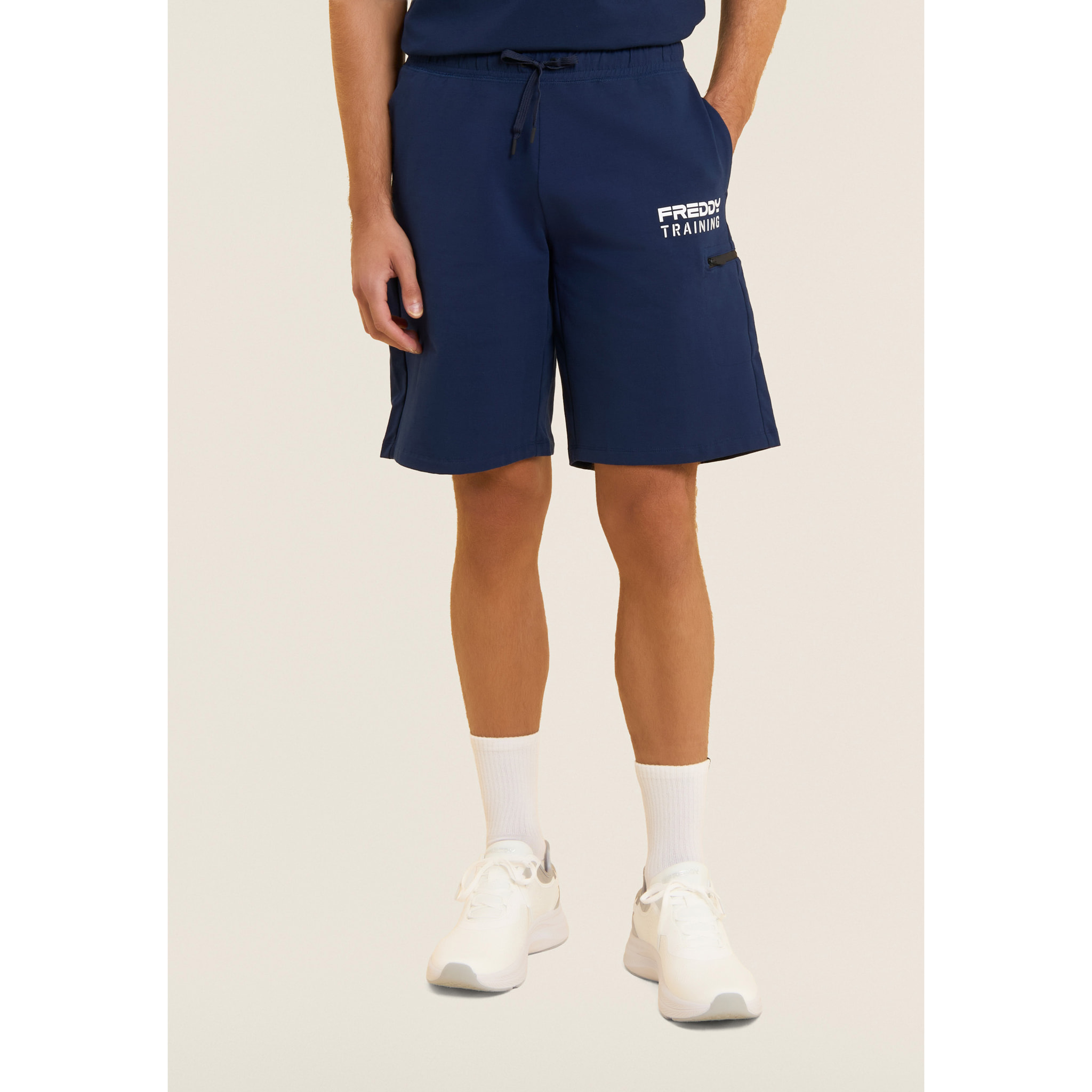 Shorts con stampa "TRAINING" e tasca zip